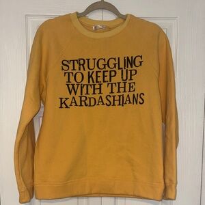 Yellow Graphic Sweatshirt - 'Struggling to Keep Up' size Small. NWOT.
